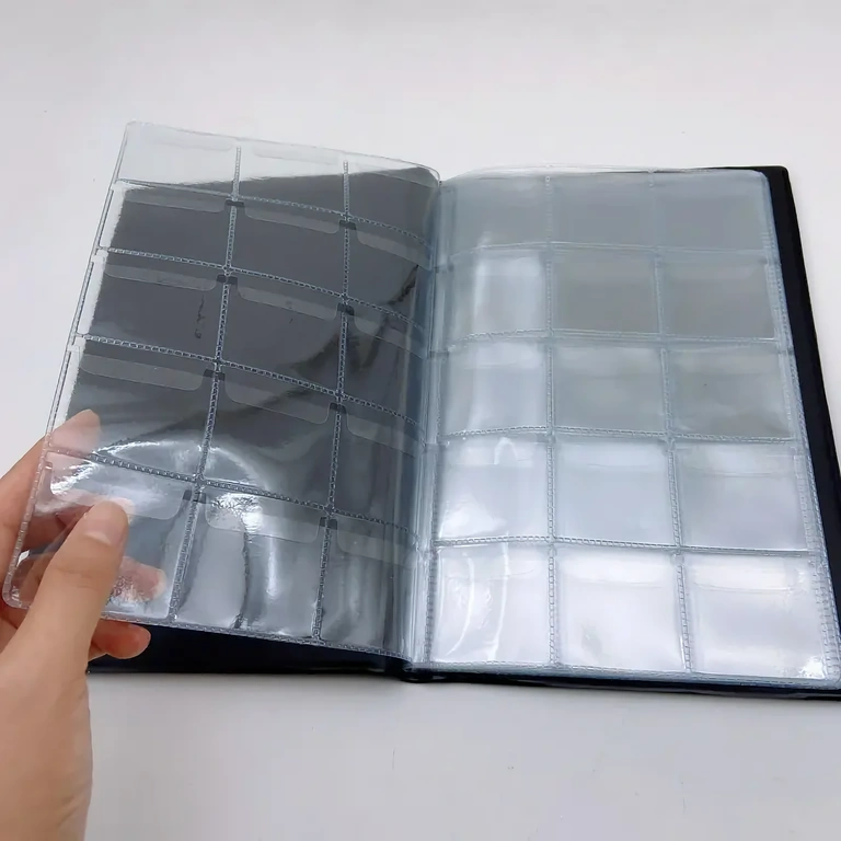 Албум с решетки и клапи за сигурно закрепване на монетите